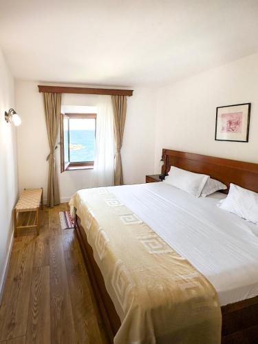 Una cama o camas en una habitación de Hotel Palata Venezia