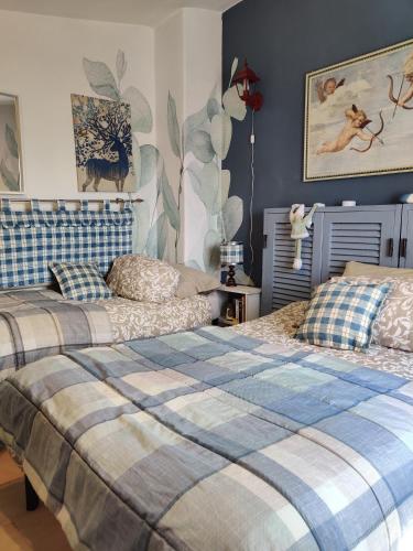 Postel nebo postele na pokoji v ubytování B&B LE GRETTE