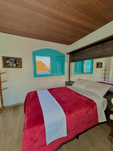 Cama o camas de una habitación en Casa do Rogério Hostel