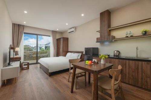 Postel nebo postele na pokoji v ubytování Fuji Apartment Hoàn Kiếm