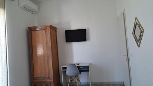 TV a/nebo společenská místnost v ubytování La riva