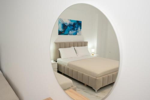 Postel nebo postele na pokoji v ubytování Kalasa Hotel