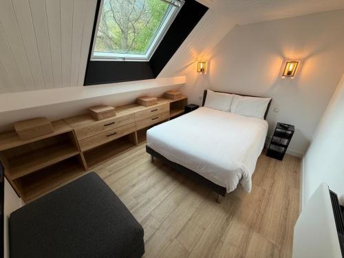 Ένα ή περισσότερα κρεβάτια σε δωμάτιο στο Chalet Prorel Serre Chevalier