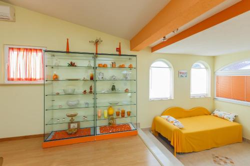 Postel nebo postele na pokoji v ubytování Apartman Lucija