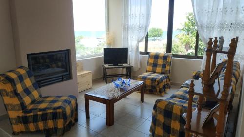TV a/nebo společenská místnost v ubytování Villa Ocean with panoramic view