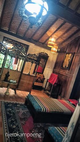 Χώρος καθιστικού στο Njero Kampoeng Homestay By Akasha