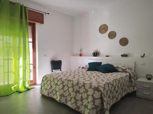 Ένα ή περισσότερα κρεβάτια σε δωμάτιο στο Cà Porto-Rooms with Balcony&Terrace