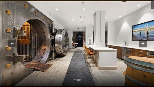 a wine tasting room with a large wine barrel at Historic Charm meet Modern Amenities in Tacoma