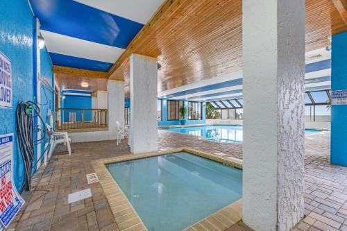 a swimming pool in the middle of a building at Monterey Bay 617 in Myrtle Beach