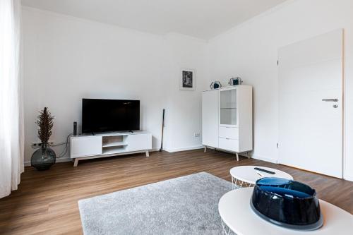 Et tv og/eller underholdning på Stilvolle & Helle Wohnung