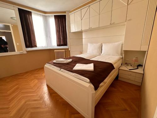 Una cama o camas en una habitación de Urban Nest Sarajevo