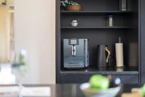 Una cocina o zona de cocina en Chasa Chaposch