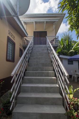 a set of stairs leading up to a house at Soleil Levant in Victoria