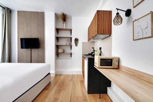 Studio-Suite 4 stars, 15m from Eiffel, Refined