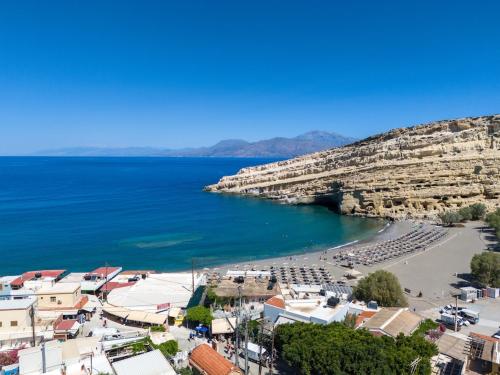 a view of a beach next to the ocean at Suite Mary Matala in Matala