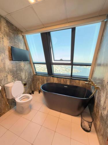 Et badeværelse på Safina Style Luxury Ocean View Stay