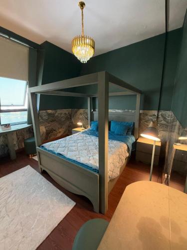 En eller flere senge i et værelse på Safina Style Luxury Ocean View Stay