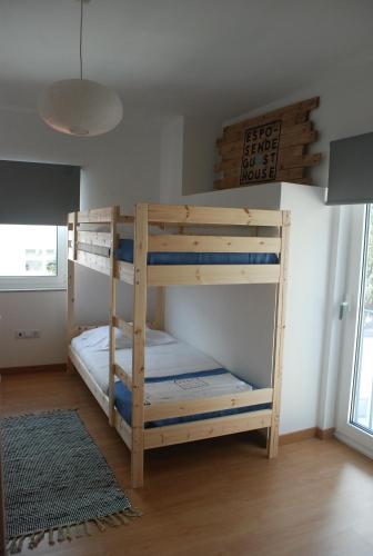 a bunk bed room with two bunk beds in a room at EsposendeGuesthouse in Esposende