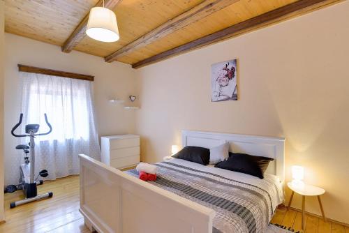 Postel nebo postele na pokoji v ubytování Holiday Home Batelani