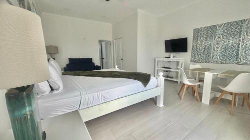 Postel nebo postele na pokoji v ubytování Bon Esprit Villa