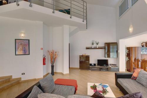 a living room with a couch and a table at Villa Marcelia in Pula