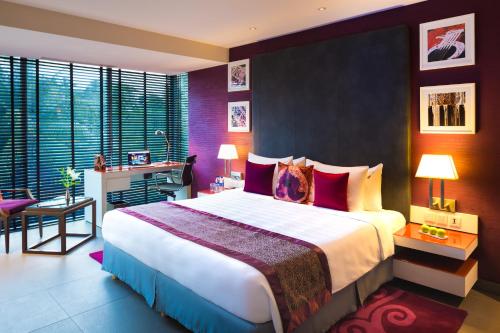Säng eller sängar i ett rum på Hard Rock Hotel Goa Calangute