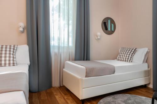 Postel nebo postele na pokoji v ubytování Hotel Vagabond