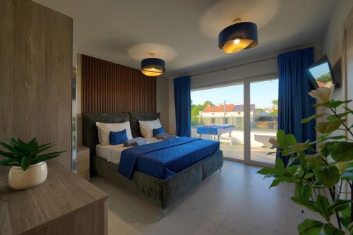 Ένα ή περισσότερα κρεβάτια σε δωμάτιο στο Villa Bavigo