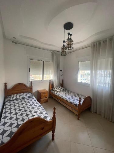 Postel nebo postele na pokoji v ubytování Casa Maraam Chaouen
