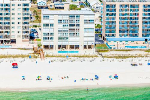 an aerial view of a beach with buildings at The Edgewater 44 in Gulf Shores