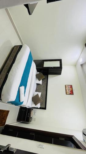 a bedroom with a bed in a room at Hotel The Majestic Taj Near Tajmahal in Agra