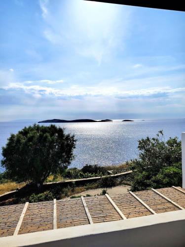 a view of a large body of water at Cycladic Horizon Island Villa By Hostandros in Batsi