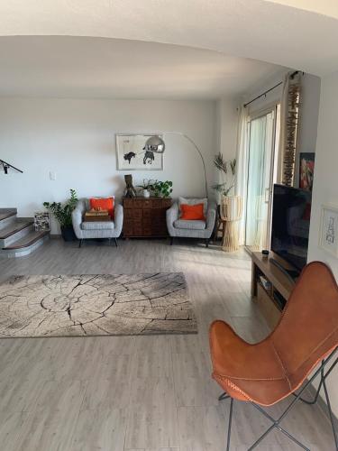 Vue mer appartement duplex en bas de maison