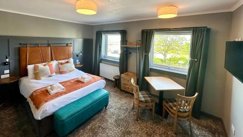 Postel nebo postele na pokoji v ubytování The Hebridean - Rooms & Apartments