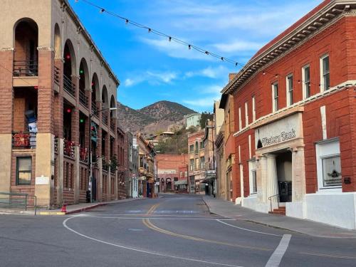 an empty street in an old town with buildings at Deluxe Room at The Block in Bisbee