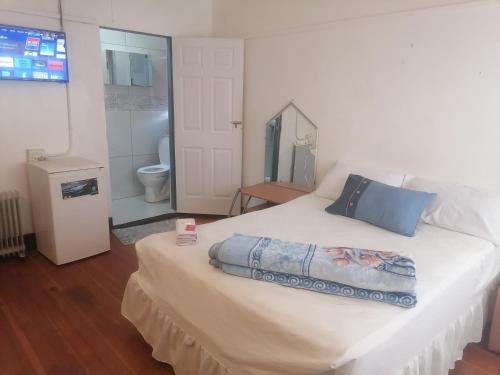 Ένα ή περισσότερα κρεβάτια σε δωμάτιο στο Valleycenter guestlodge