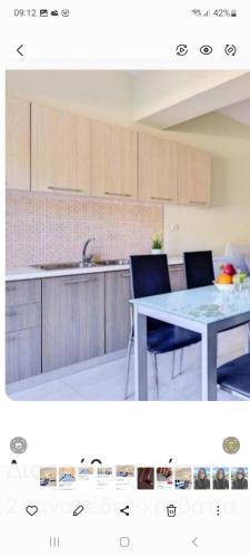 Kuchyň nebo kuchyňský kout v ubytování Oceana Suites