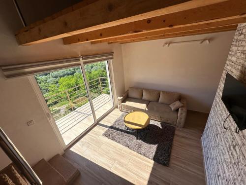 an overhead view of a living room with a couch at Brioni in Virpazar