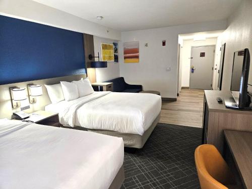 Ένα ή περισσότερα κρεβάτια σε δωμάτιο στο Comfort Suites Gastonia - Charlotte