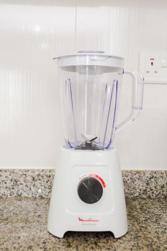 a blender sitting on top of a counter at Accra Luxury Apartments at The Gallery in Accra