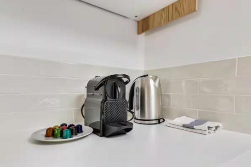 Photo de la galerie de l'établissement Marais Historical Center Parisian Apartment 3BR Ouvert, à Paris