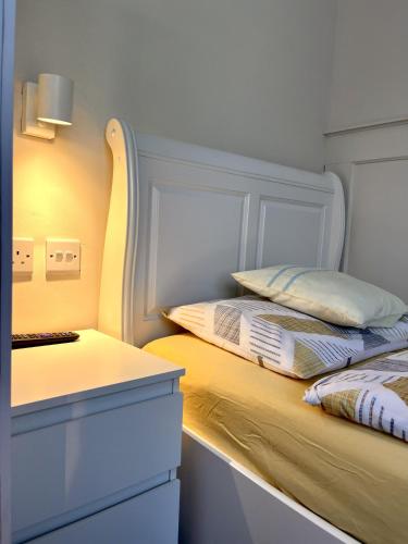 Postel nebo postele na pokoji v ubytování Home accommodation
