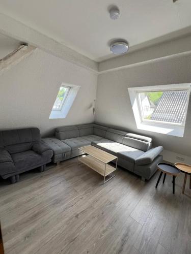 a living room with a couch and a coffee table at Frische Luft in Meschede