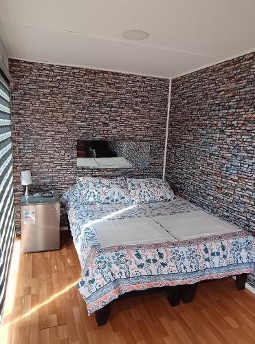 Postel nebo postele na pokoji v ubytování Don Luis Lodge
