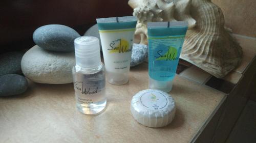 a group of products sitting on a counter with rocks at Villa UNIDERA in Kouklia