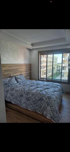Una cama o camas en una habitación de Residence Garden Paradise plage luxe