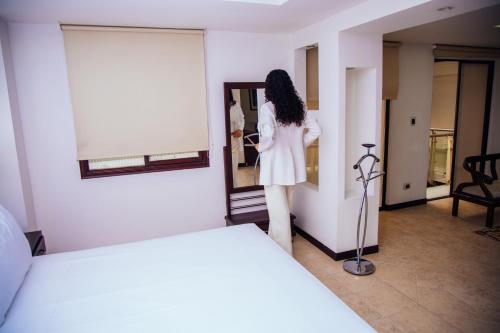 Cama o camas de una habitación en Hotel Plaza Las Américas Cali