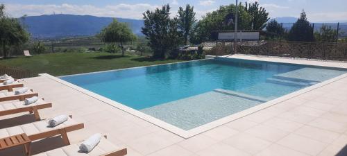 Der Swimmingpool an oder in der Nähe von Macedonium Luxury Villa with big pool & Fireplace