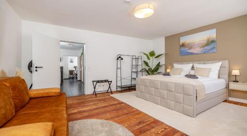Ένα ή περισσότερα κρεβάτια σε δωμάτιο στο LUXX HOME Ravensburg City