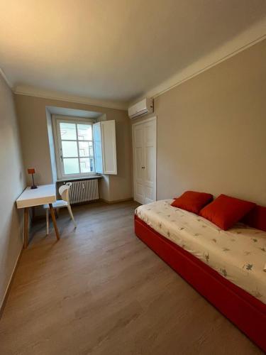 Letto o letti in una camera di BelAbrì - central charme&comfort -mansarde e appartamento